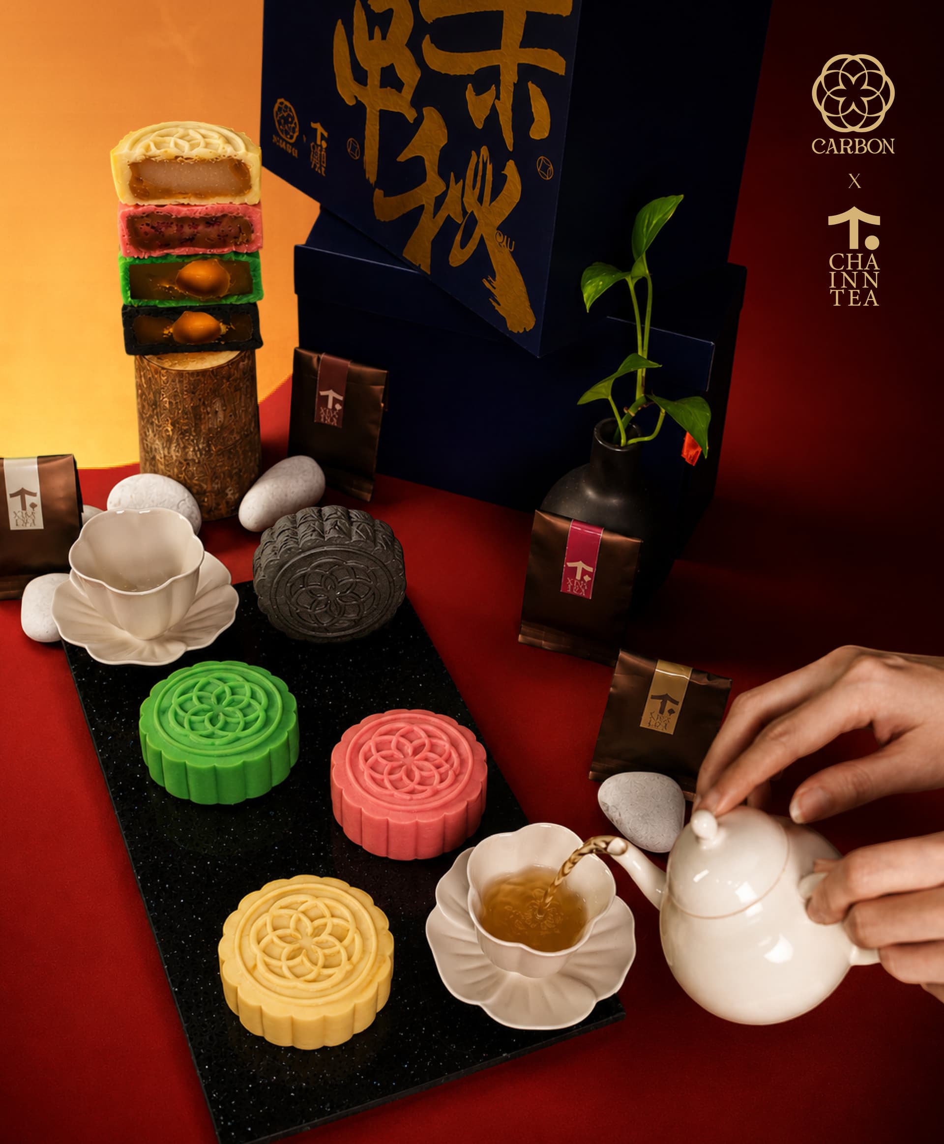 Pouring Cha Inn tea beside the Leaf & Ember mooncakes
